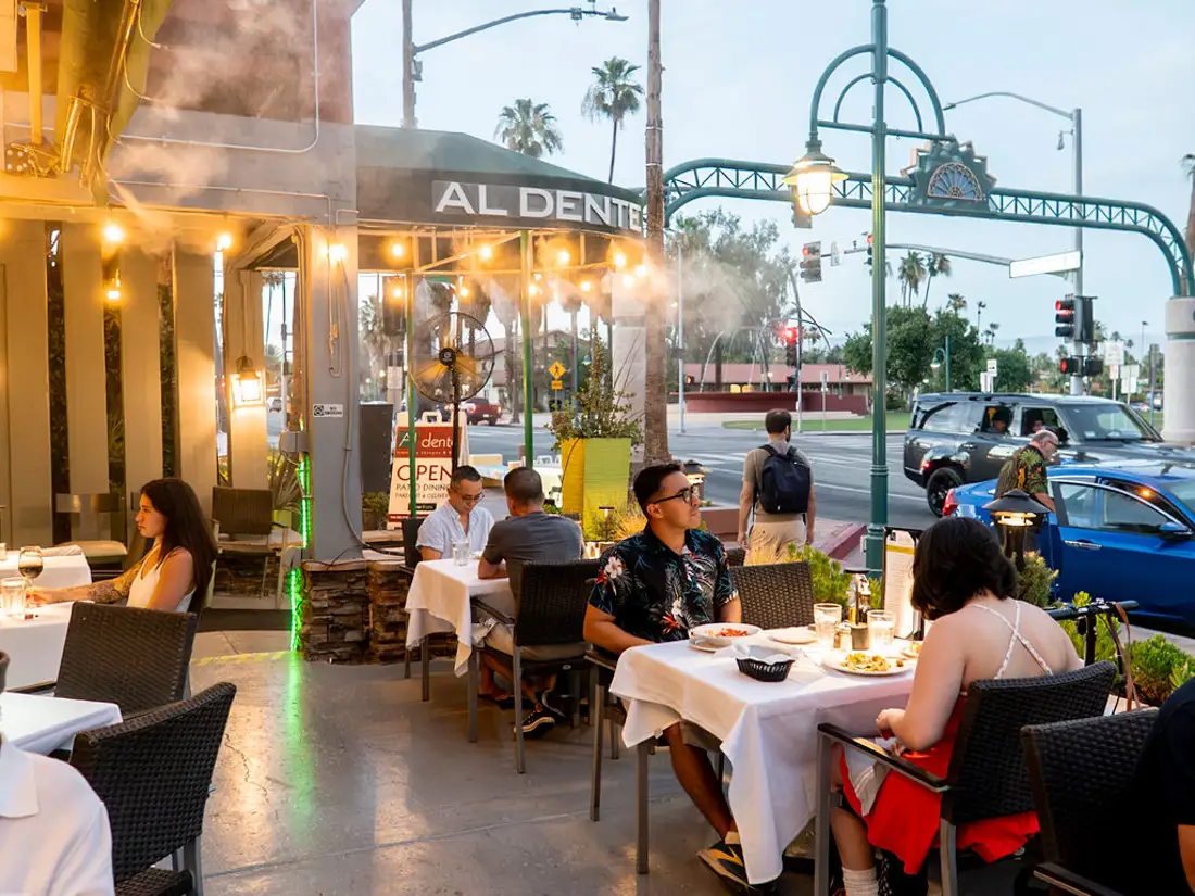 Guests enjoying a meal on the patio at Al Dente in downtown Palm Springs. 